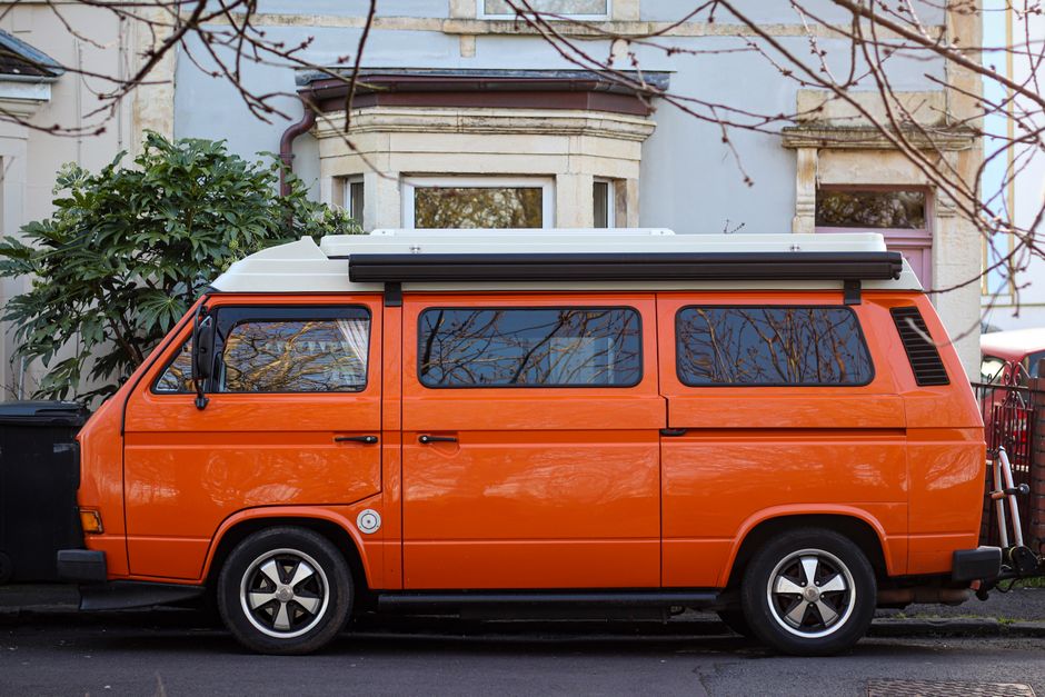 Van loaded with furniture and boxed household items during a clearance job