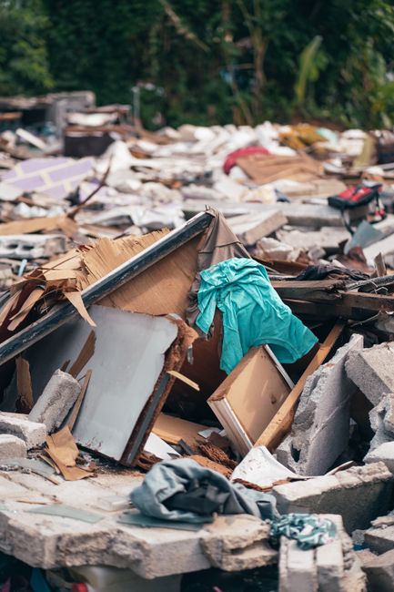 A pile of mixed construction and demolition debris, representative of the DIY waste materials covered by a permit
