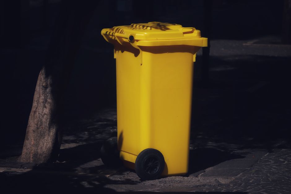 A wheelie bin left out at the property boundary ready for collection