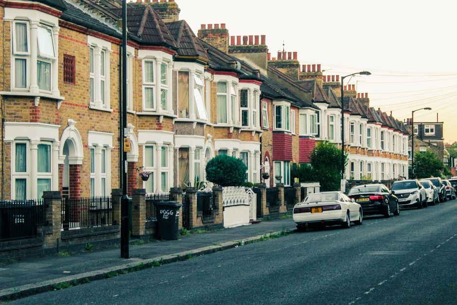 A row of London terraced houses on a residential street