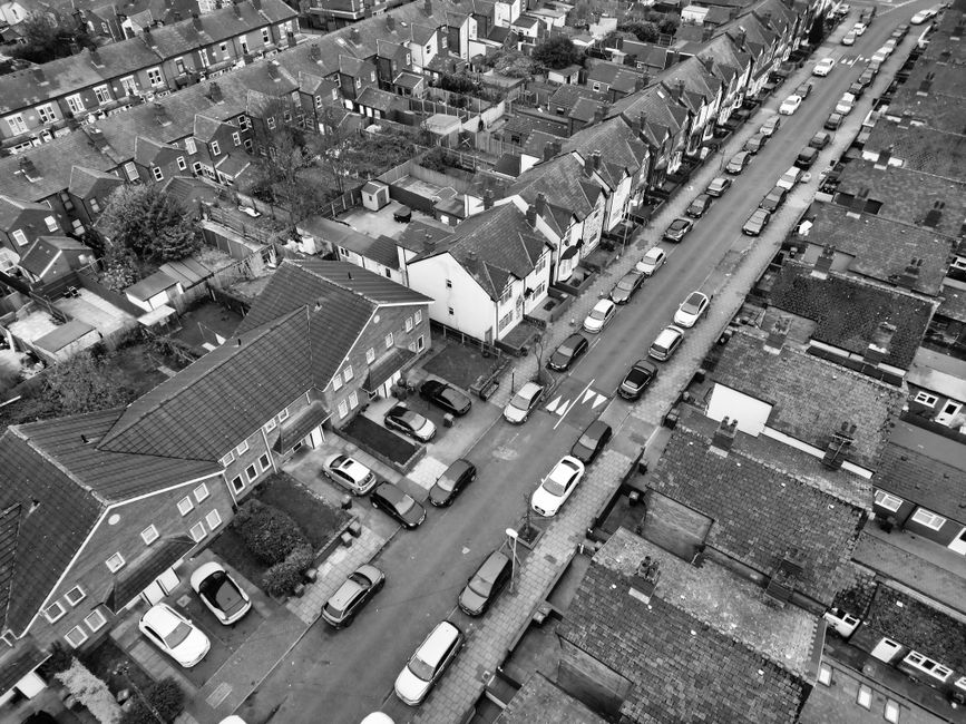 Aerial view of a terraced residential street in a London suburb