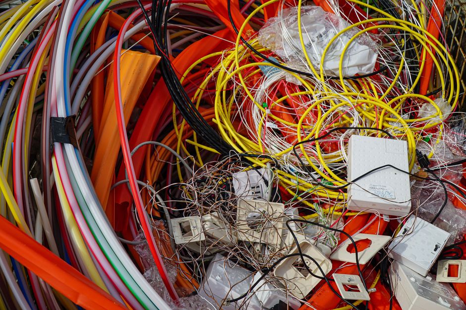 Sorted electrical cables and small appliance waste ready for recycling