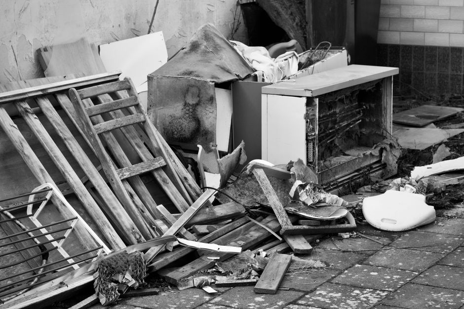 Old furniture and discarded household items left out for bulky waste collection